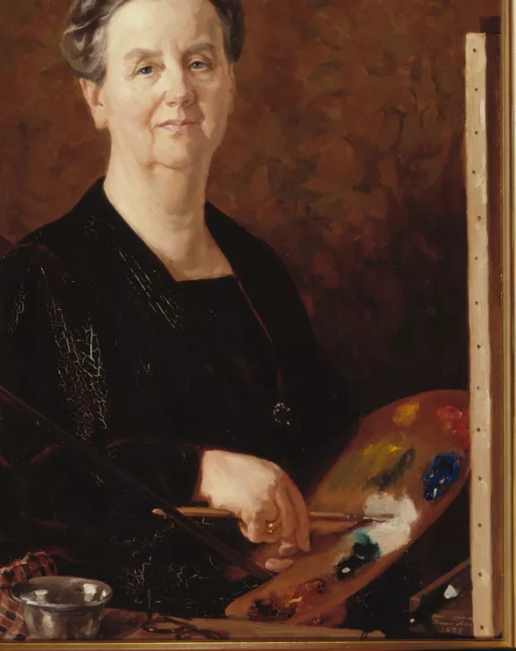Een portret van Koningin Wilhelmina die aan het schilderen is
