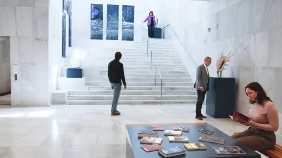 Visitors walking past Caitlin Berrigan’s artwork Diamonds